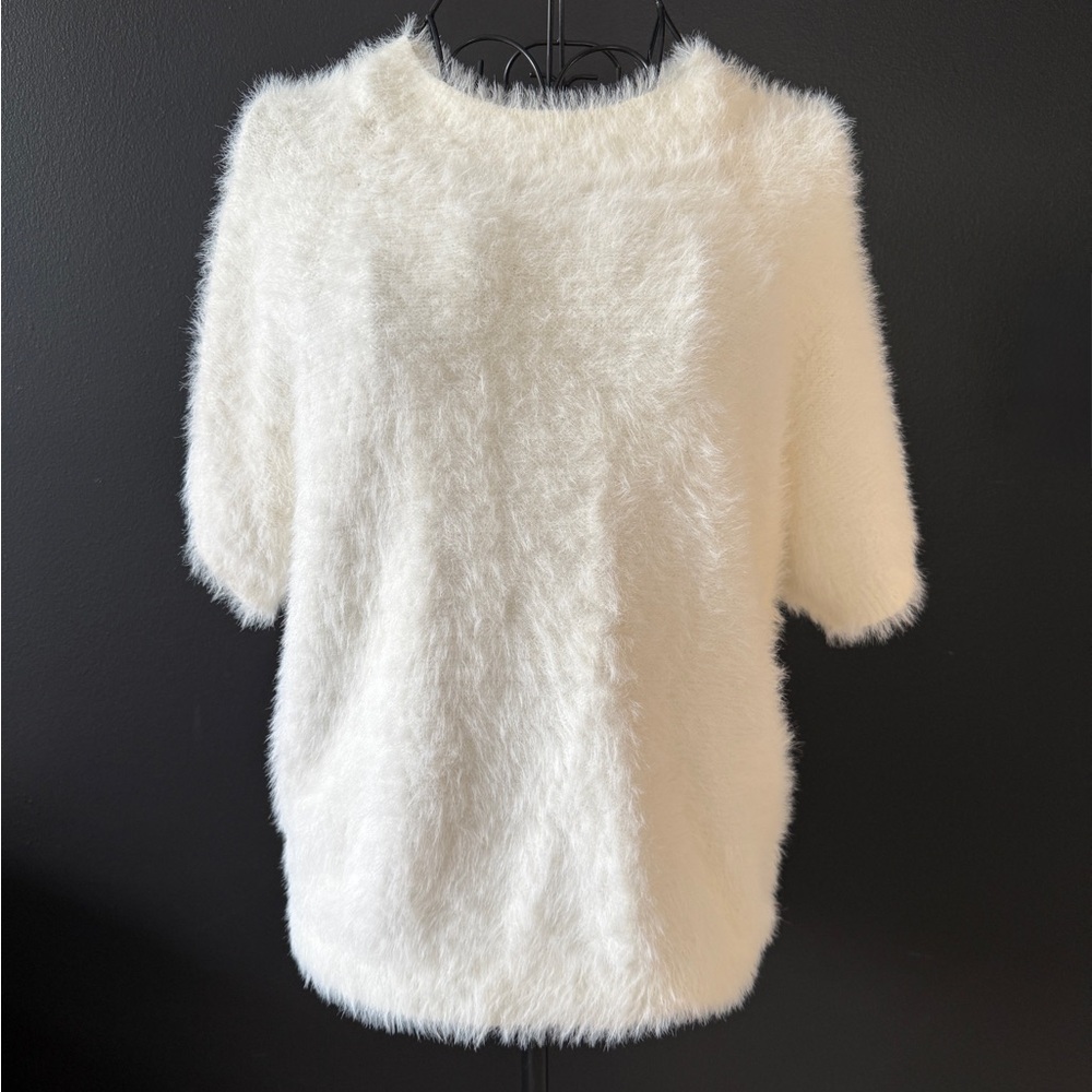 Anthropologie’s Pilcro Fuzzy Crewneck Sweater in white